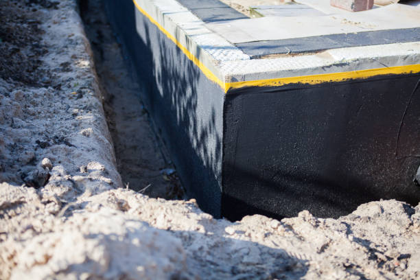 Professional Waterproofing technician working in Marshall, VA